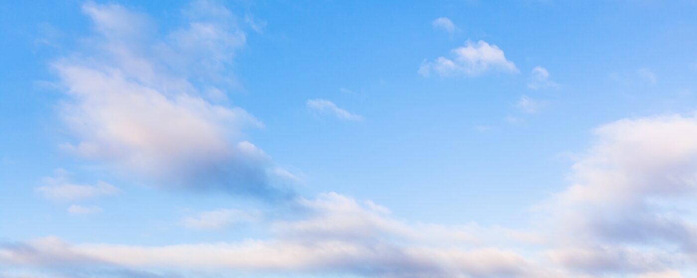 low clouds in blue sky in evening twilight